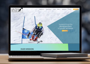 Lake Tahoe Ski Club Foundation website on a laptop screen in front of snowy window